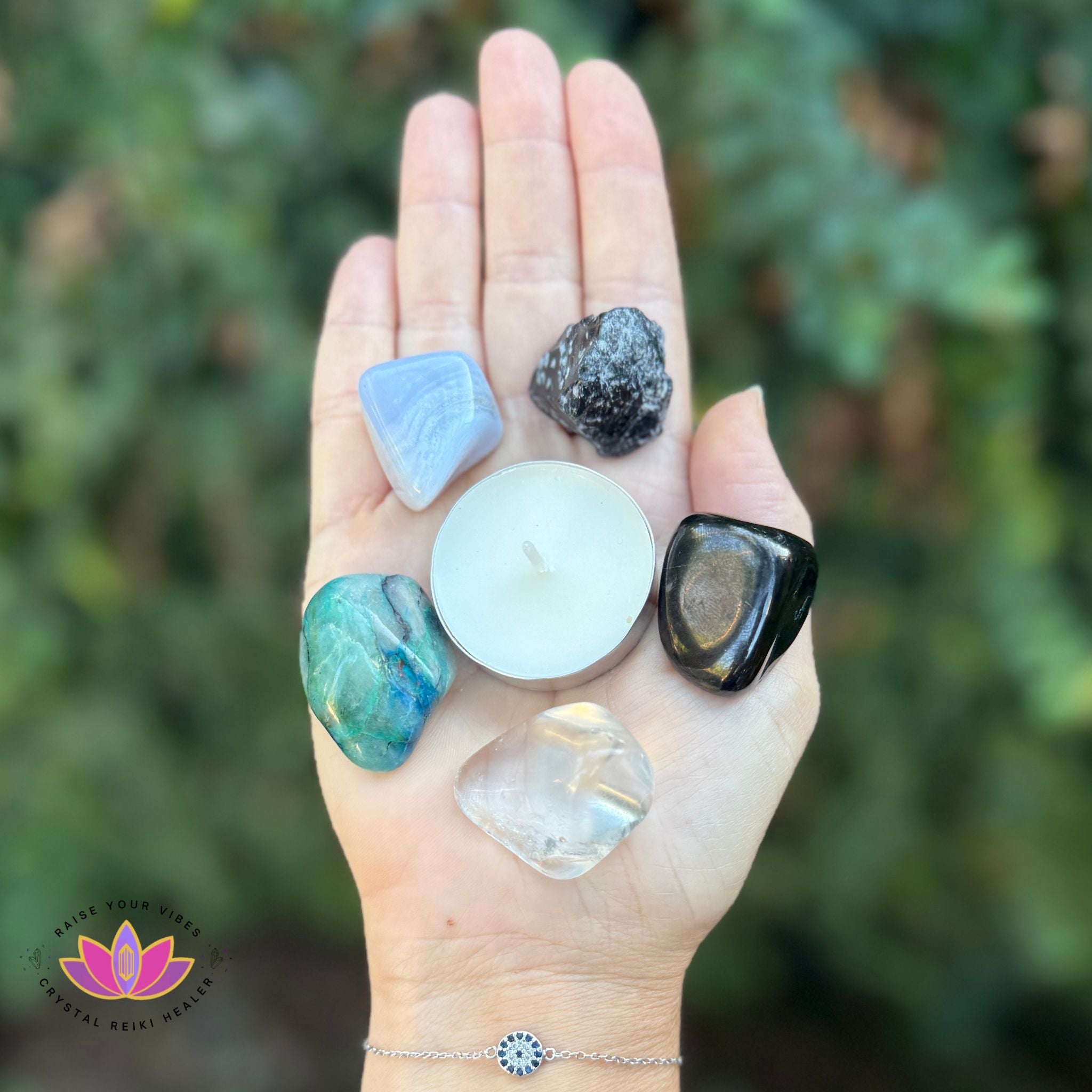 Reiki-infused Mercury Retrograde crystal set with hand-selected stones, tealight candle, and sage for grounding, clarity, and communication.